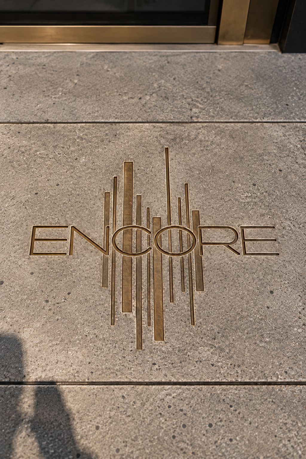 The Encore logo set into the floor