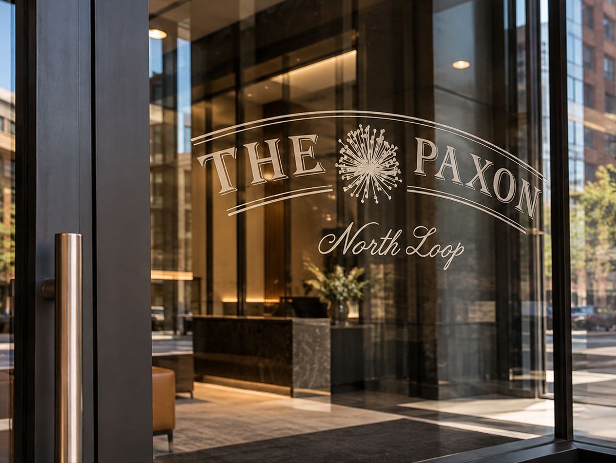 The Paxon logo on the glass entry doors