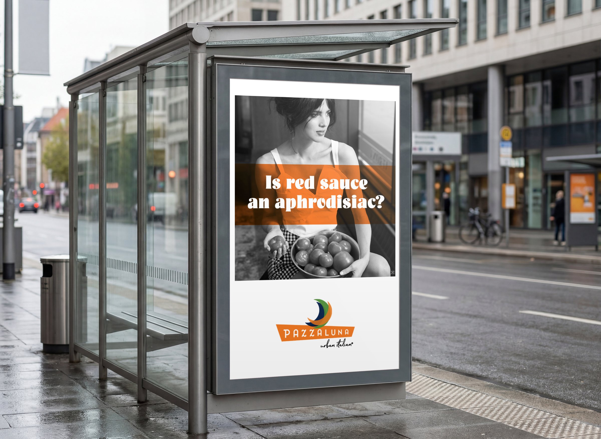 A Pazzaluna ad in a bus shelter on a city street: Is red sauce an aphrodisiac?